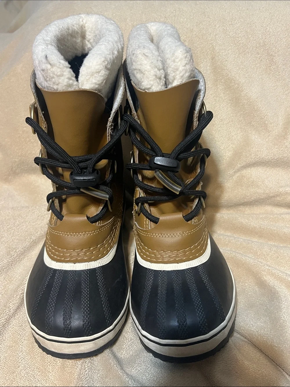 Sorel kids Tan and Black Waterproof Snow Boot with White Fleece Cuff- size 1
